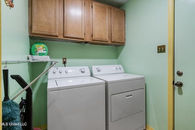 2804 Oakridge Cir, Gulfport, MS 39507 - laundry room featuring washing machine and dryer and cabinet space