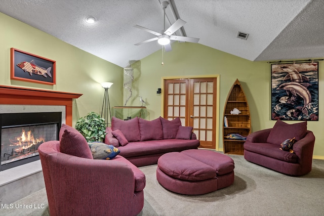 2804 Oakridge Cir, Gulfport, MS 39507 - living room featuring a warm lit fireplace, lofted ceiling, a textured ceiling, carpet floors, and ceiling fan