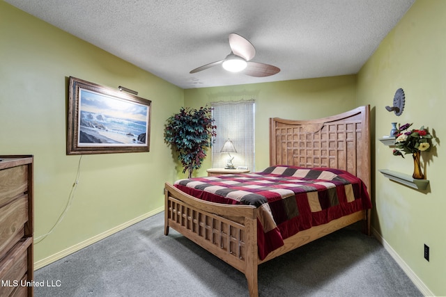 2804 Oakridge Cir, Gulfport, MS 39507 - bedroom featuring carpet flooring, a textured ceiling, baseboards, and a ceiling fan