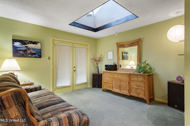 2804 Oakridge Cir, Gulfport, MS 39507 - sitting room featuring a skylight, french doors, carpet, and a textured ceiling