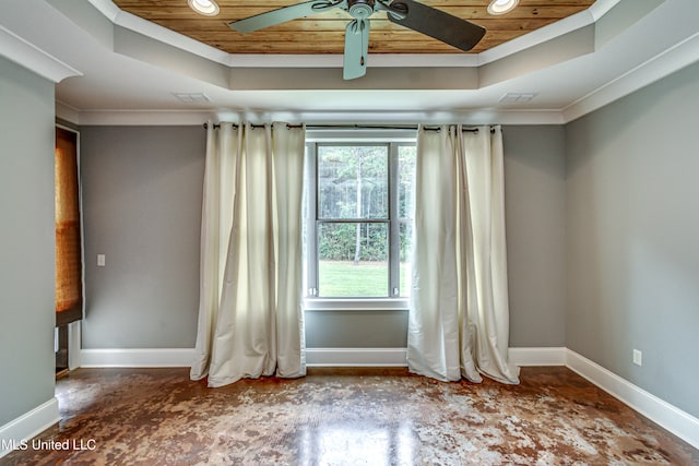 empty room featuring ornamental molding, ceiling fan, a raised ceiling, and wood ceiling