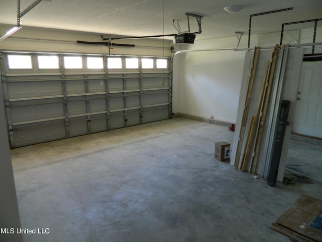 garage featuring a garage door opener