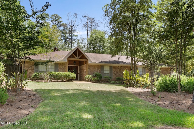 ranch-style home with a front lawn