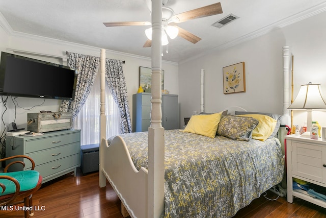 bedroom with ceiling fan, ornamental molding, and dark hardwood / wood-style flooring