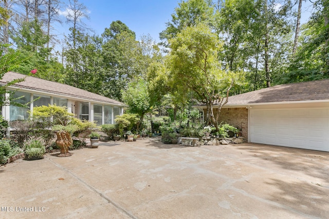 view of patio with a garage