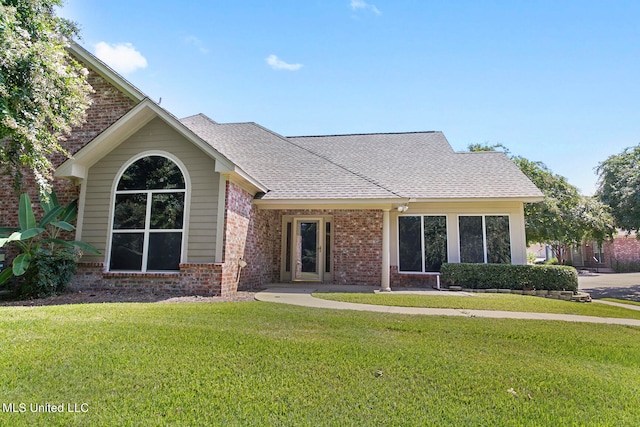 view of front of home with a front lawn