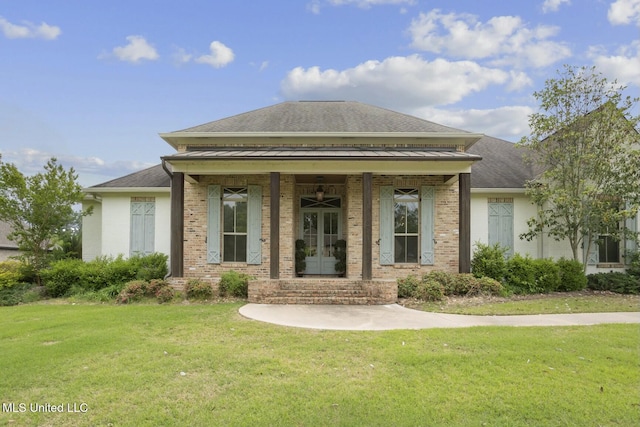 133 Saddlebrook Cv, Madison, MS 39110 - view of front facade with brick siding, a porch, a shingled roof, and a front yard