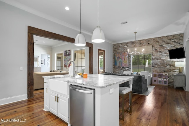 133 Saddlebrook Cv, Madison, MS 39110 - kitchen featuring a sink, hardwood / wood-style flooring, open floor plan, light stone counters, and dishwasher