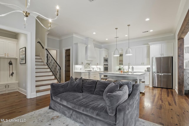 133 Saddlebrook Cv, Madison, MS 39110 - living area featuring baseboards, recessed lighting, dark wood-type flooring, and stairway