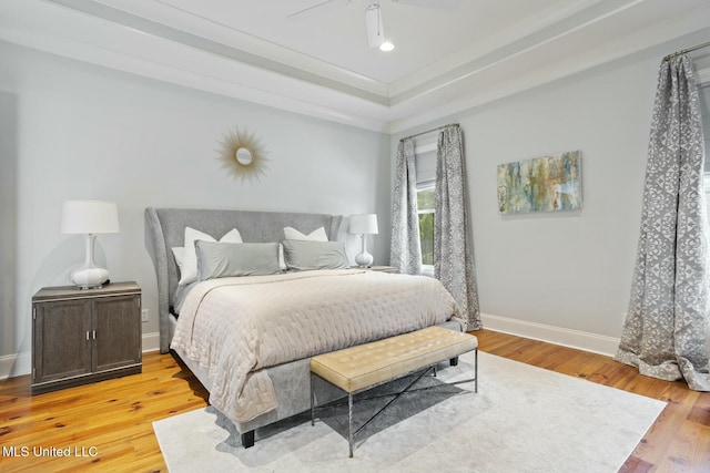 133 Saddlebrook Cv, Madison, MS 39110 - bedroom featuring light wood-style flooring, baseboards, and ceiling fan
