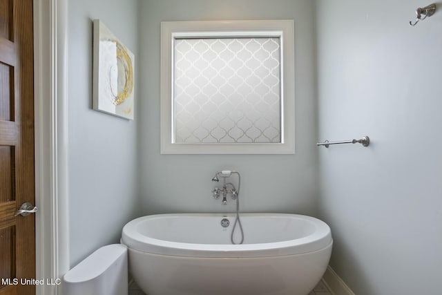 133 Saddlebrook Cv, Madison, MS 39110 - bathroom featuring a freestanding tub