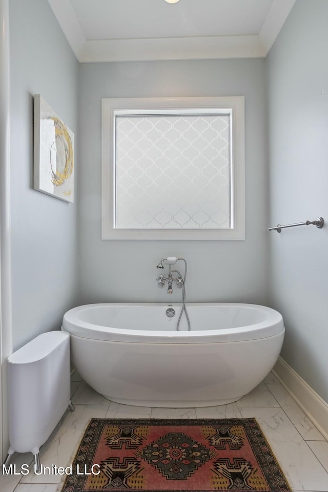 133 Saddlebrook Cv, Madison, MS 39110 - full bathroom featuring baseboards, marble finish floor, and a freestanding bath