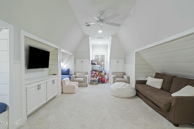 133 Saddlebrook Cv, Madison, MS 39110 - living area with a wainscoted wall, vaulted ceiling, visible vents, light colored carpet, and ceiling fan