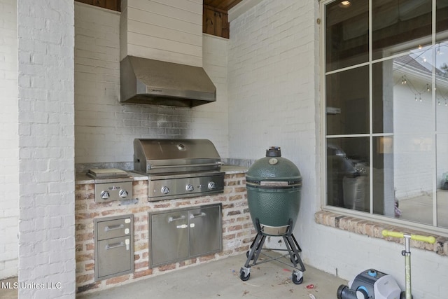 133 Saddlebrook Cv, Madison, MS 39110 - view of patio / terrace featuring exterior kitchen and a grill