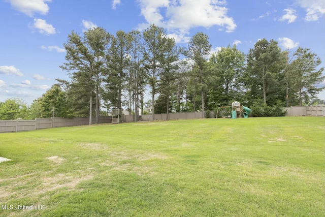 133 Saddlebrook Cv, Madison, MS 39110 - view of yard featuring a playground and fence