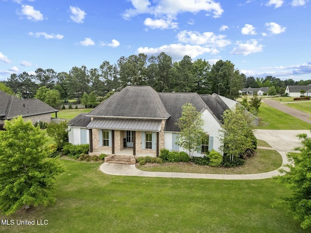133 Saddlebrook Cv, Madison, MS 39110 - view of front facade featuring a porch and a front yard