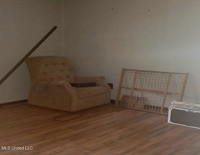 sitting room with hardwood / wood-style floors