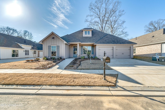 605 Cobalt Way, Brandon, MS 39042 - view of front of house featuring concrete driveway, an attached garage, roof with shingles, and board and batten siding