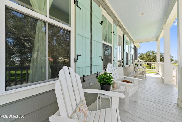 wooden deck featuring a porch