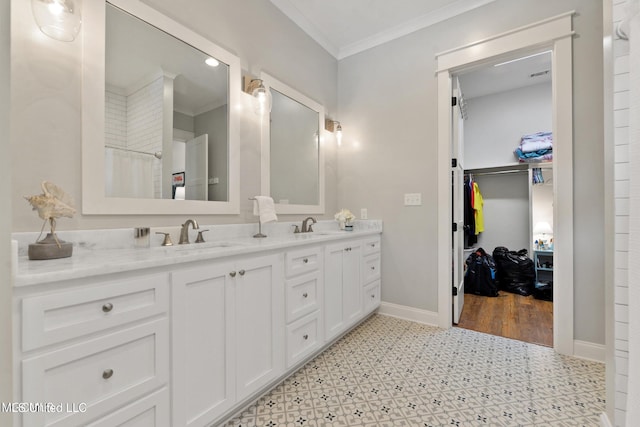 bathroom with hardwood / wood-style flooring, vanity, curtained shower, and crown molding