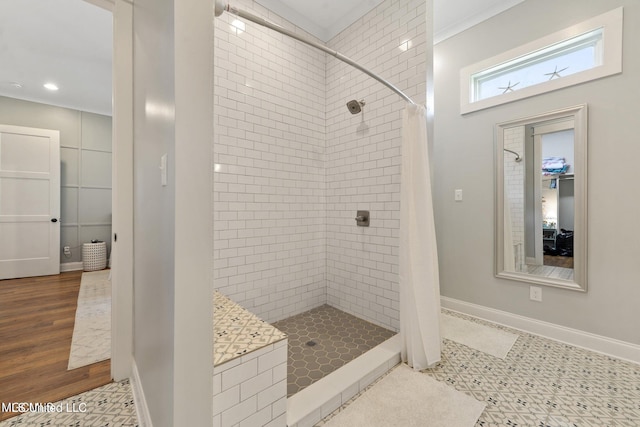 bathroom featuring ornamental molding, hardwood / wood-style floors, and a shower with curtain