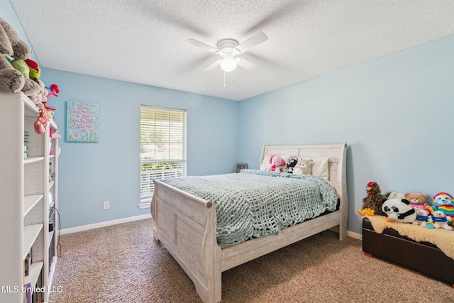 4628 Breland Rd, Vancleave, MS 39565 - bedroom with carpet floors, baseboards, ceiling fan, and a textured ceiling