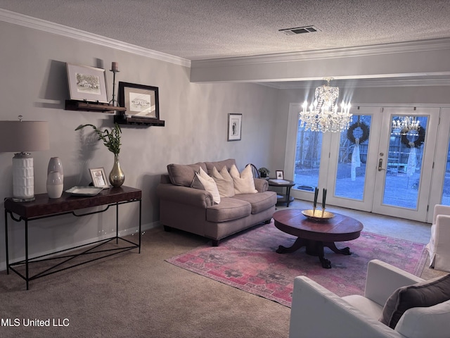 1202 Hemingway St, Greenwood, MS 38930 - carpeted living area featuring a textured ceiling, visible vents, crown molding, and a notable chandelier