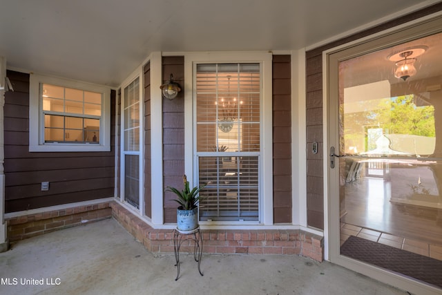 entrance to property with covered porch