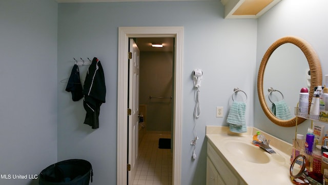 bathroom with vanity and tile patterned floors