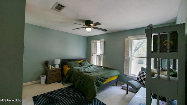 carpeted bedroom featuring ceiling fan