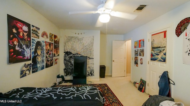 carpeted bedroom featuring ceiling fan