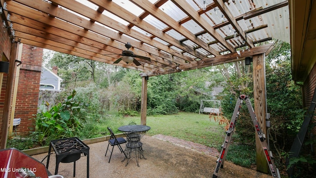 view of patio / terrace featuring ceiling fan and a pergola