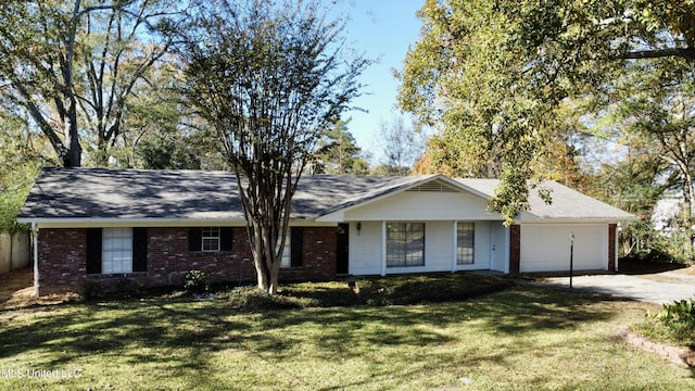 single story home featuring a porch, a garage, and a front lawn