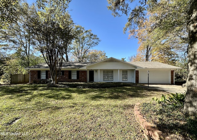 single story home with a garage and a front lawn