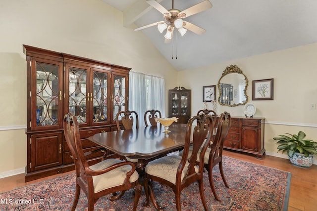 6658 Ahekolo Cir, Diamondhead, MS 39525 - dining space featuring beamed ceiling, ceiling fan, wood finished floors, and high vaulted ceiling