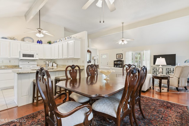 6658 Ahekolo Cir, Diamondhead, MS 39525 - dining space featuring a ceiling fan and dark wood-style floors