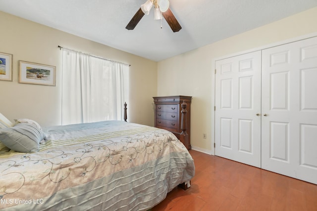 6658 Ahekolo Cir, Diamondhead, MS 39525 - bedroom with wood finished floors, a closet, and a ceiling fan