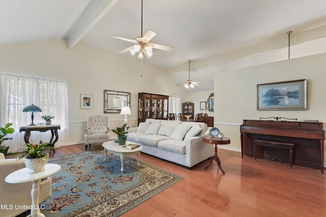6658 Ahekolo Cir, Diamondhead, MS 39525 - living area featuring a ceiling fan, healthy amount of natural light, and wood finished floors