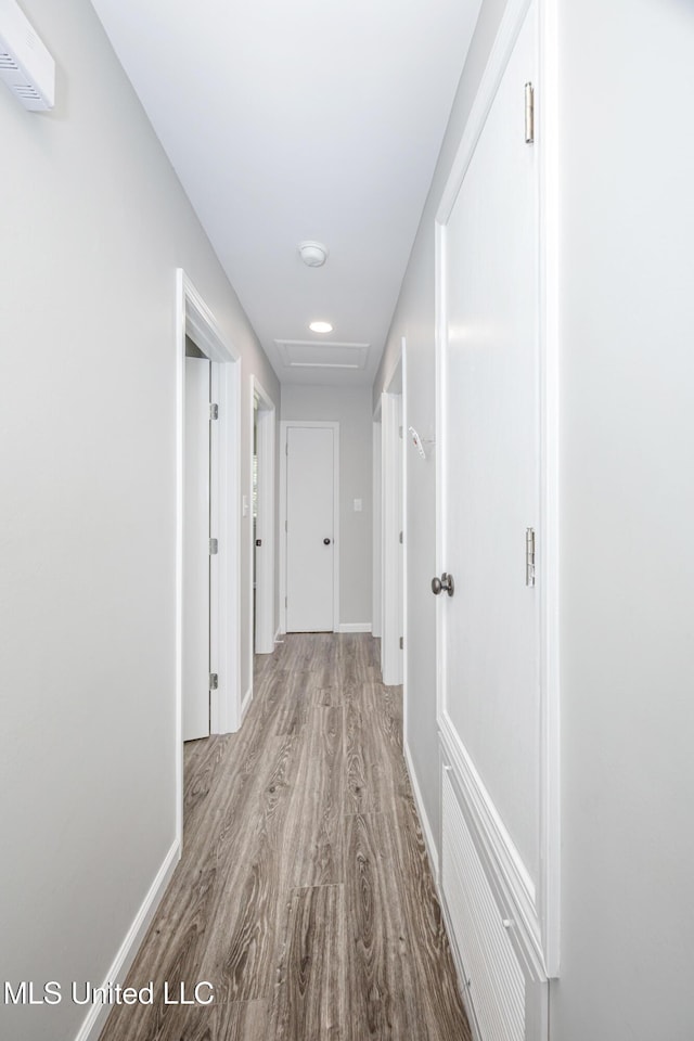 hallway featuring light hardwood / wood-style flooring