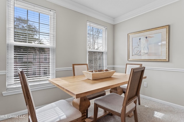 dining room with ornamental molding