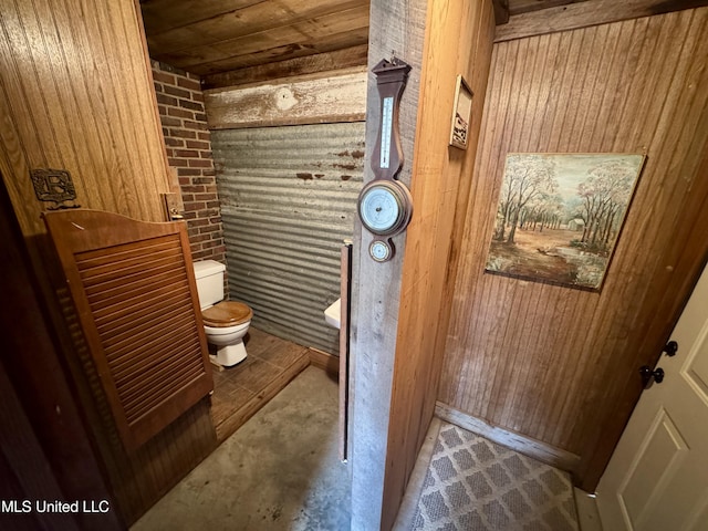 14 Fava St, Alligator, MS 38720 - bathroom with wood ceiling, brick wall, and wooden walls