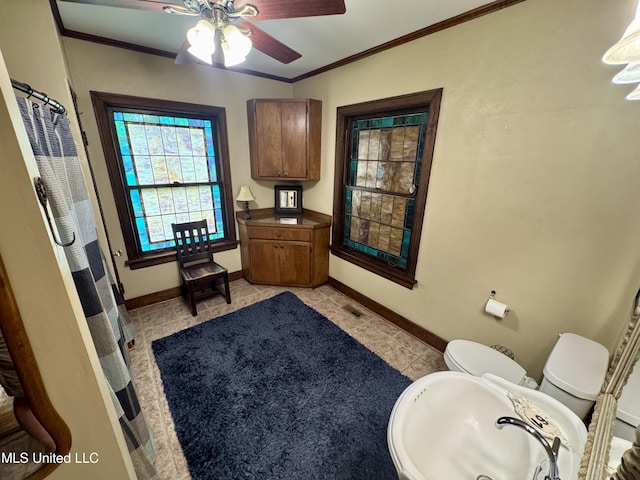 14 Fava St, Alligator, MS 38720 - full bathroom featuring a ceiling fan and ornamental molding