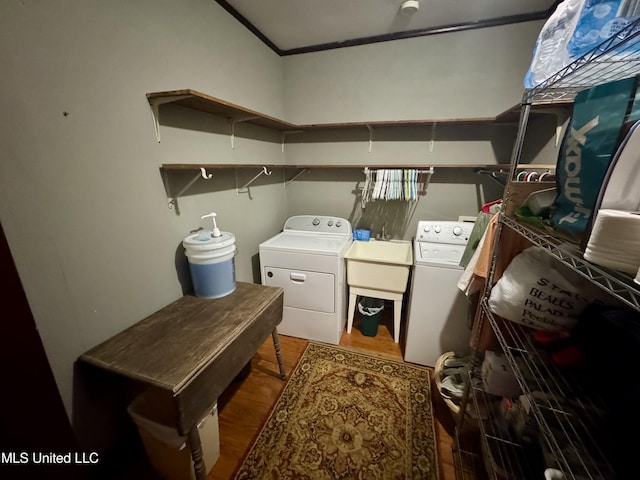 14 Fava St, Alligator, MS 38720 - laundry area featuring washer and dryer and ornamental molding