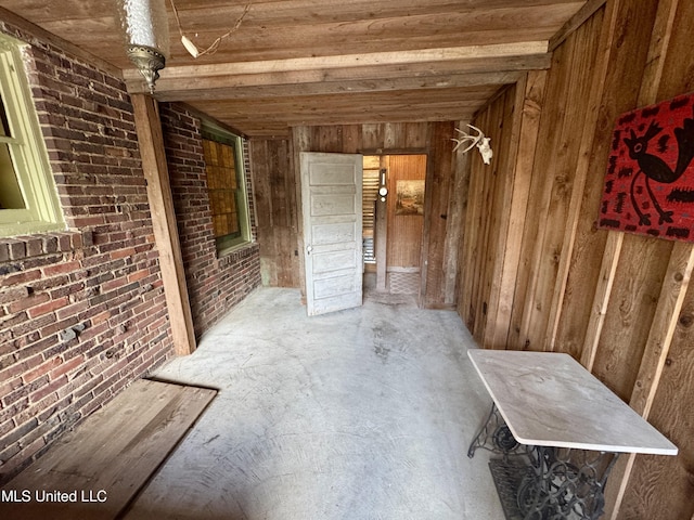 14 Fava St, Alligator, MS 38720 - misc room featuring wood ceiling, wood walls, and brick wall