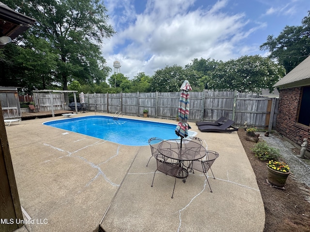 14 Fava St, Alligator, MS 38720 - view of pool featuring a patio area, a fenced backyard, and a diving board
