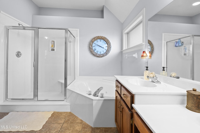 bathroom featuring vanity, separate shower and tub, and tile patterned floors