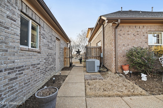 view of property exterior with central AC unit