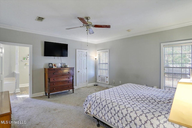 bedroom featuring crown molding, light colored carpet, connected bathroom, and ceiling fan