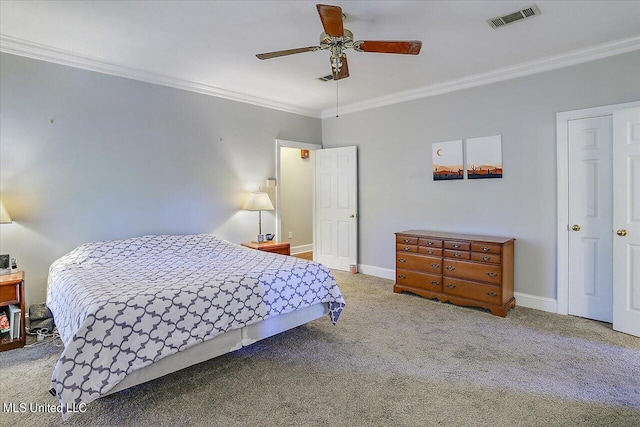 bedroom with crown molding, light colored carpet, and ceiling fan