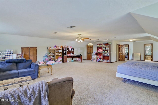 bedroom with lofted ceiling, carpet floors, and ceiling fan